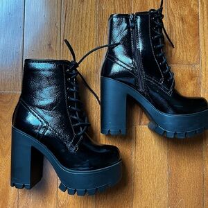 Black platform heel lace up ankle boots
